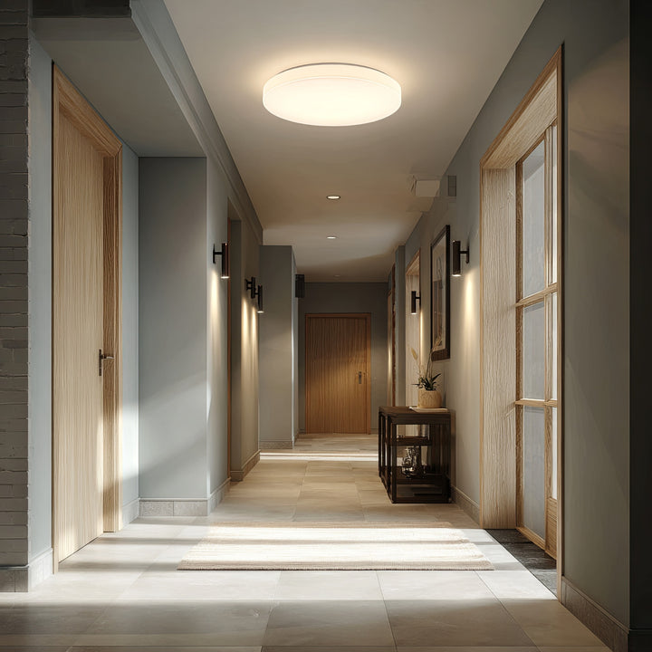 Maclean MCE347 LED sensor ceiling lamp. With a 5.8GHz microwave sensor, it emits a 4000K light with 12W power and 950lm brightness. Rated IP44, it ensures durability and reliability in various settings.