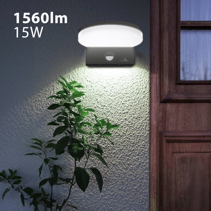 Maclean MCE344 B motion sensor LED lamp. With a PIR motion sensor, it emits neutral white light (4000K) with 15W power and 1560lm brightness. Rated IP65, it ensures durability and reliability in various settings.