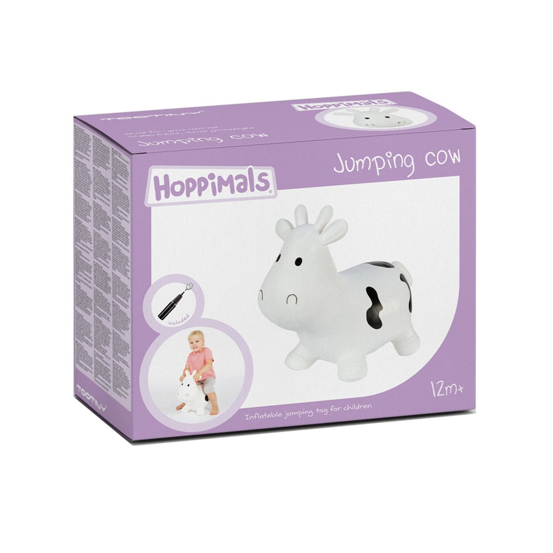 Vit ko-gummiströja enorm och unik kul när du hoppar med Hoppimals luftpump