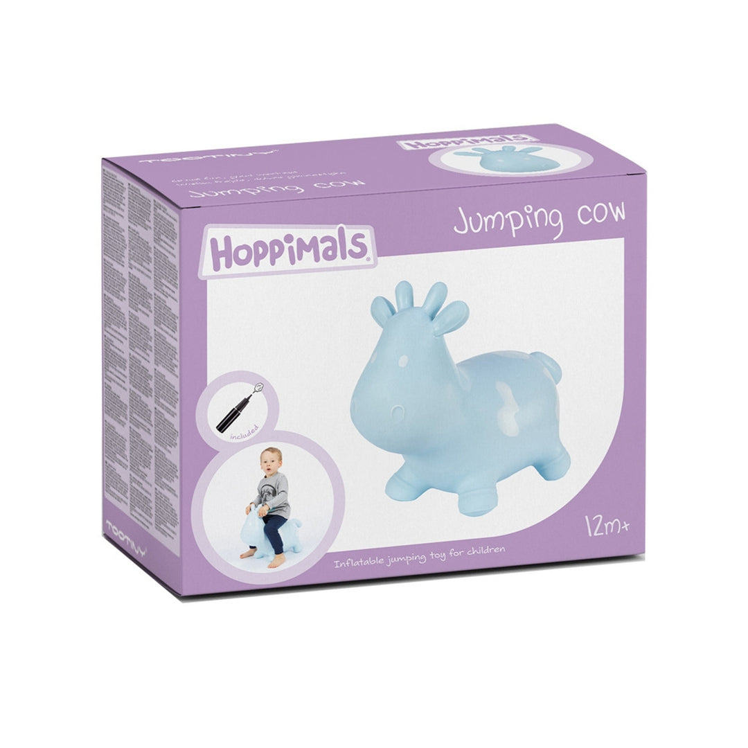 Vit ko-gummiströja enorm och unik kul när du hoppar med Hoppimals luftpump