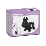 Vit ko-gummiströja enorm och unik kul när du hoppar med Hoppimals luftpump